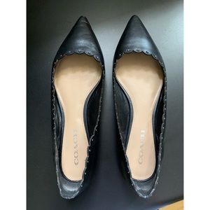 Coach black flats with stud detail